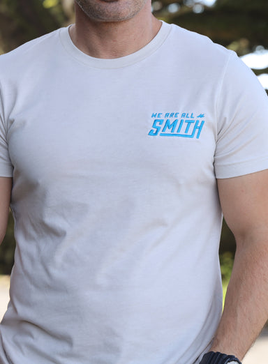 Heather Dust Blue WAAS logo Unisex t-shirt T-Shirts WE ARE ALL SMITH: Men's Jewelry & Clothing.   