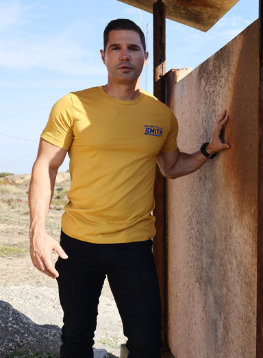 Yellow WAAS Embroidered Logo Unisex t-shirt  WE ARE ALL SMITH: Men's Jewelry & Clothing.   