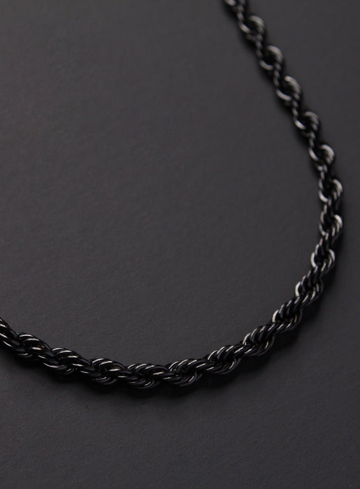Black string necklace and oblong metal tag - knots